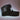 Black trucker hat with a mesh back and the word "BREAD" prominently displayed in white on the front.