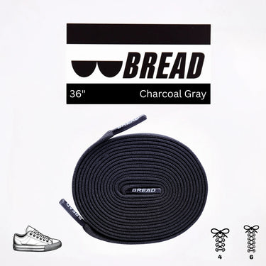 Charcoal grey elastic shoelaces, 36 inches long, coiled with branded ends and a graphic label.