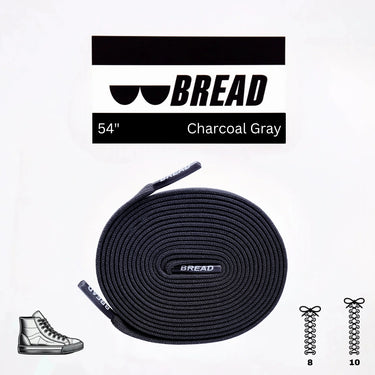 Charcoal grey elastic shoelaces, 54 inches long, coiled with black aglets, designed for easy lacing.
