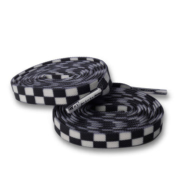 White checkered elastic shoelaces rolled up, featuring a black and white checkerboard pattern.