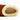 Women's Ashton slipper featuring a brown suede exterior and a soft cream-colored fleece lining.