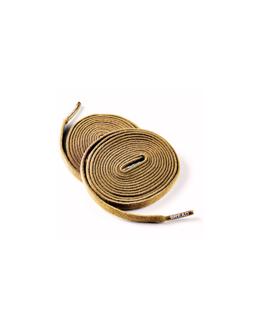 Coyote brown elastic shoelaces, coiled neatly, featuring a textured surface and a branded tip.