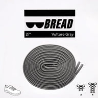 Vulture gray elastic shoelaces, 27 inches long, coiled with a shoe graphic and branding above.