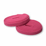 Neon pink elastic shoelaces rolled into two loops on a white background.