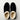 Men's Ashton slipper in black suede with a cream-colored faux fur lining, viewed from above.