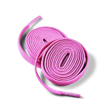 Elastic shoelaces in a vibrant pink color, coiled neatly on a white background.