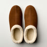 Women's Ashton slipper in brown suede with a soft white fleece lining, viewed from above.
